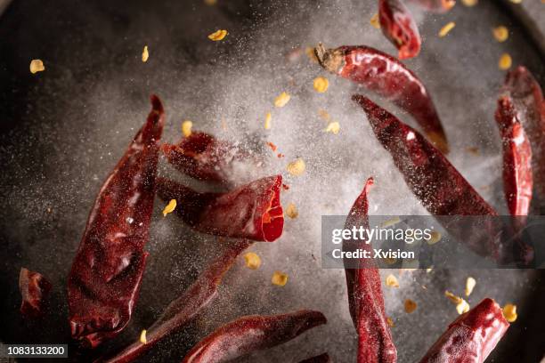 red chili pepper in high speed photographer - pimenta imagens e fotografias de stock