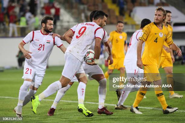 Omar Alsoma of Syria celebrates after scoring a goal to make it 2-2 during the AFC Asian Cup Group B match between Australia and Syria at Khalifa Bin...