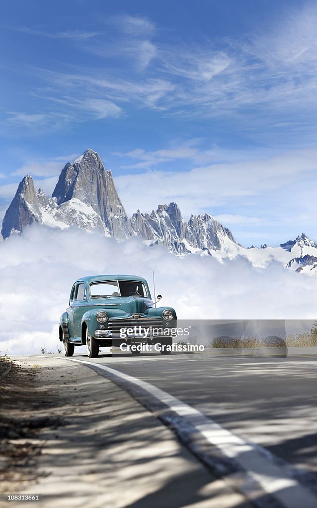 Blue sky over antique car driving in Patagonia Argentina