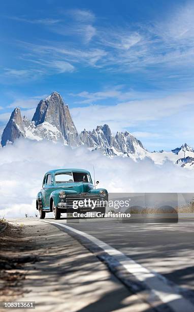 blue sky over antique car driving in patagonia argentina - antique car bildbanksfoton och bilder