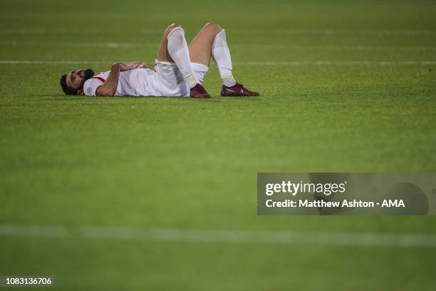 Dejected Omar Khrbin of Syria reacts at full time during the AFC Asian Cup Group B match between Australia and Syria at Khalifa Bin Zayed Stadium on...