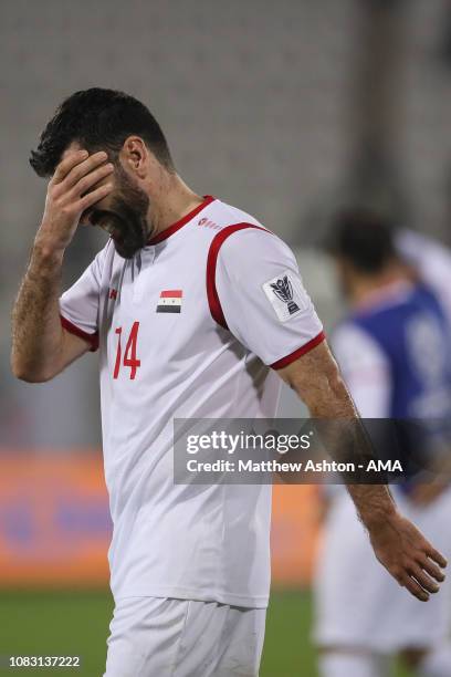 Dejected Tamer Hag Mohamad of Syria reacts at full time during the AFC Asian Cup Group B match between Australia and Syria at Khalifa Bin Zayed...