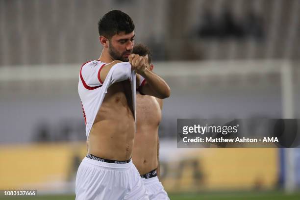 Dejected Mohammed Osman of Syria reacts at full time during the AFC Asian Cup Group B match between Australia and Syria at Khalifa Bin Zayed Stadium...