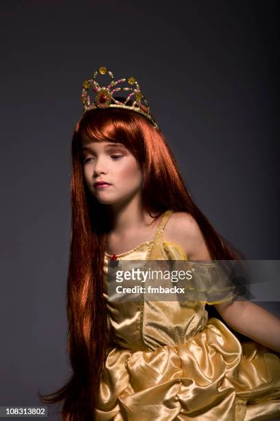little golden princess (belle) - girl gold dress stock pictures, royalty-free photos & images