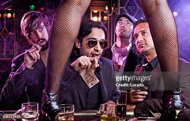 having fun guys in bar - female gangster stock pictures, royalty-free photos & images