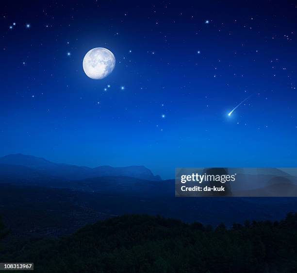 rising moon over mountains - moon and stars stock pictures, royalty-free photos & images