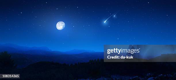 rising moon over mountains - moon and stars stock pictures, royalty-free photos & images