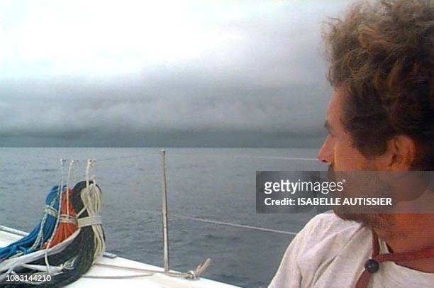 L'équipier d'Isabelle Autissier, Jean Saucet regarde l'horizon, le 03 mars à bord de son bateau , lors de la course à la voile en équipage entre...