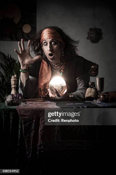 gypsy fortune teller with crystal ball - fortune teller stock pictures, royalty-free photos & images