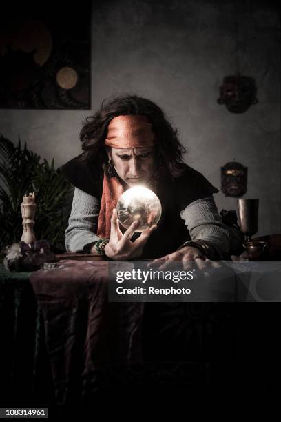 gypsy fortune teller with crystal ball - fortune teller stock pictures, royalty-free photos & images