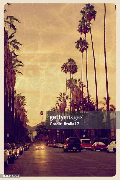 puesta de sol sobre colinas de hollywood, vintage postal - hollywood california fotografías e imágenes de stock