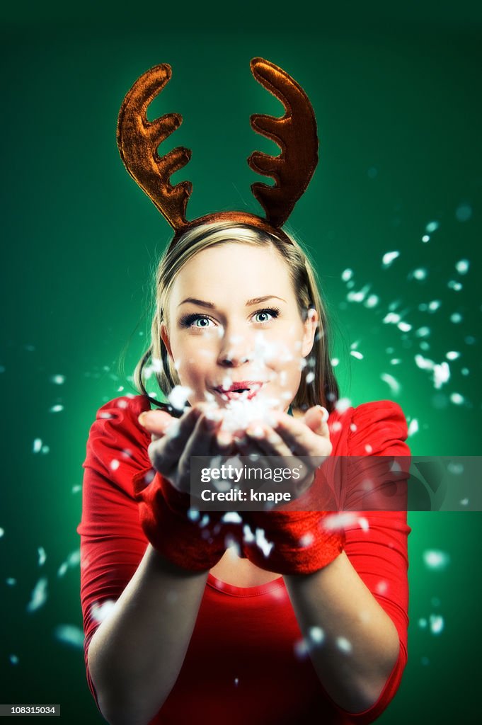 Woman in reindeer costume christmas time