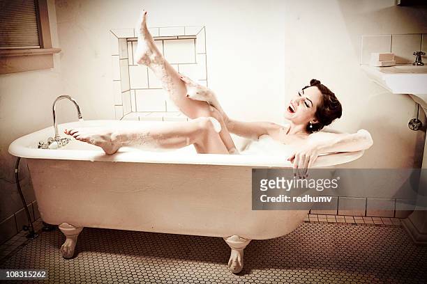 retro bathtub pinup kiss - 40s pin up girls stock pictures, royalty-free photos & images