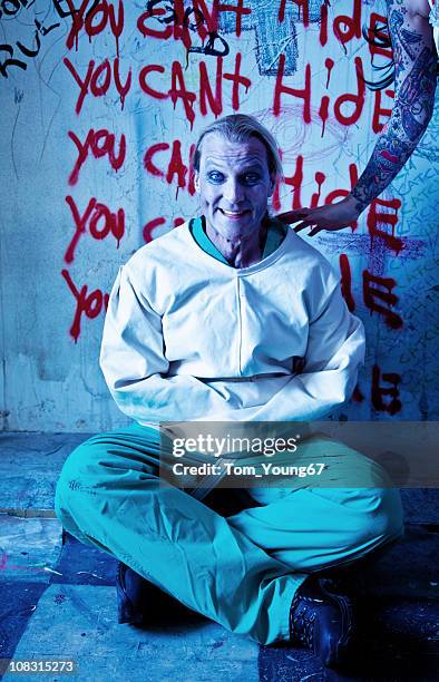 crazy - straitjacket stock pictures, royalty-free photos & images