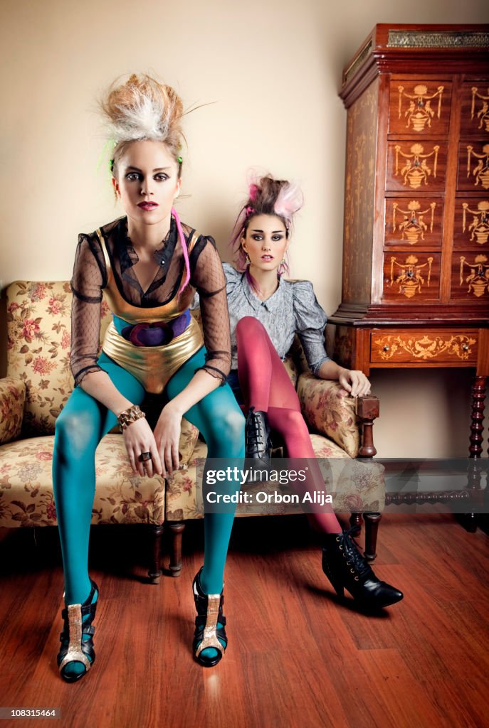 Punk girls in a retro living room