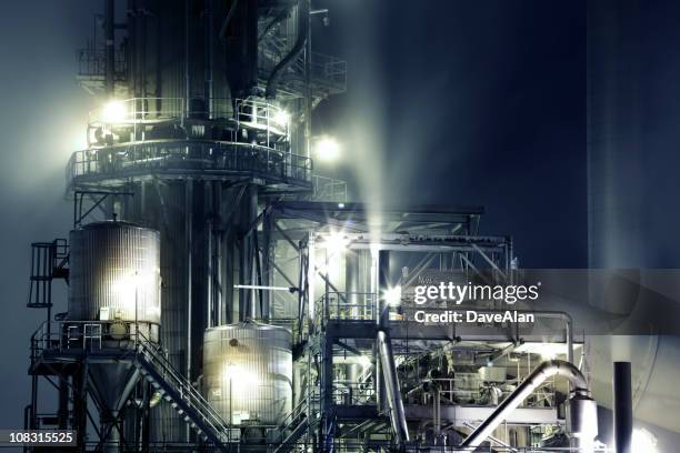 industrial complex night - pulp stock pictures, royalty-free photos & images