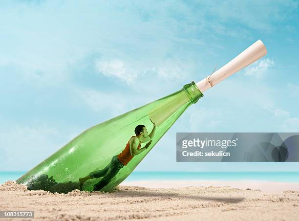 message in a bottle - buried paperwork stock pictures, royalty-free photos & images