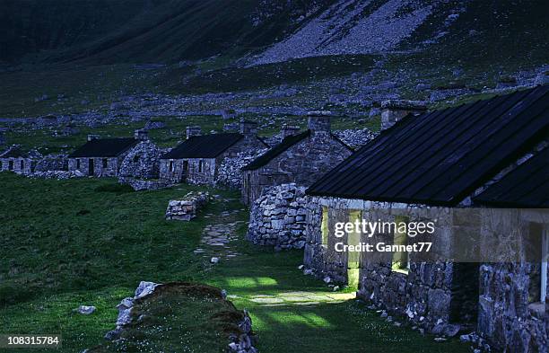 the street at dusk, st. kilda, scotland - st kilda bildbanksfoton och bilder