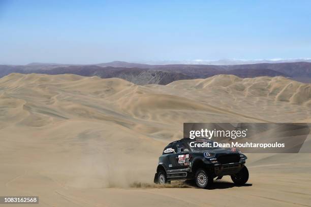 Raid Team no. 307 MINI JOHN COOPER WORKS RALLY car driven by Nani Roma of Spain and Alex Haro Bravo of Spain compete in the desert during Stage Seven...