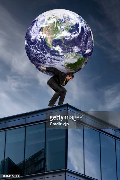 businessman with the world on his shoulders - globe businessman stockfoto's en -beelden