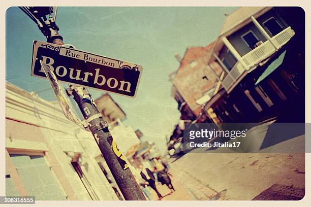 bourbon street, new orleans - vintage postcard - bourbon street new orleans stock pictures, royalty-free photos & images