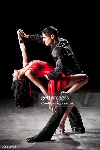 latin dance: tango dip - ballroom dancing stock pictures, royalty-free photos & images