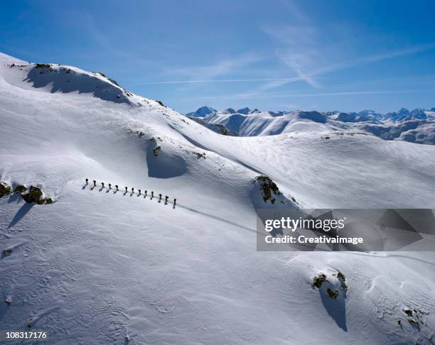 beautiful view of a snow covered mountain - cliff climbing stock pictures, royalty-free photos & images