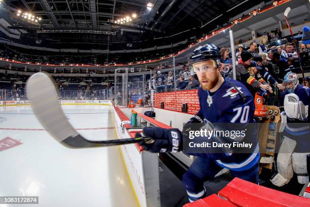 Joe Morrow of the Winnipeg Jets hits the ice for the start of the pre-game warm up prior to NHL action against the Vegas Golden Knights at the Bell...