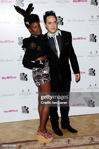 Singer Shingai Shoniwa and musician Dan Smith of the Noisettes pose in the press room at the South Bank Sky Arts Awards at The Dorchester on January...