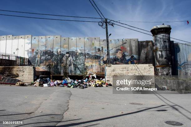 Graffiti seen on the Israeli West Bank barrier in Dheisheh Refugee Camp. The Israeli Separation Wall is a dividing barrier that separates the West...