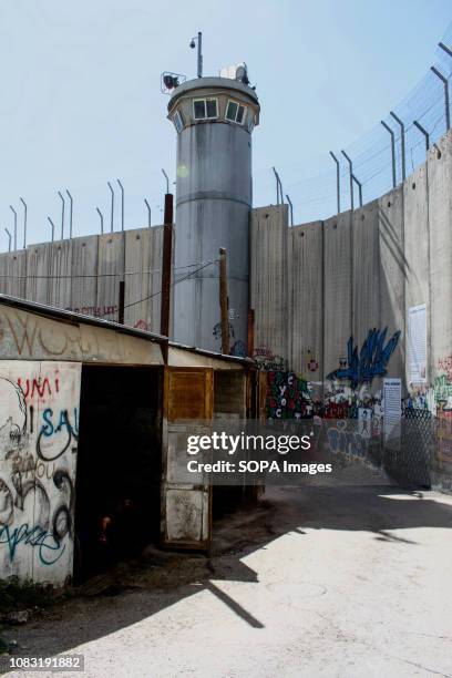 Watch tower seen alongside the Israeli West Bank. The Israeli Separation Wall is a dividing barrier that separates the West Bank from Israel.