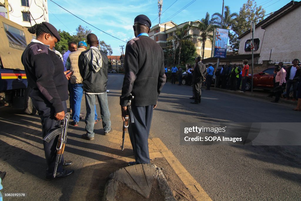 Police officials seen taking positions in Nairobi after the...