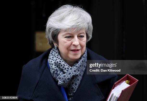 Prime Minister Theresa May leaves Downing Street ahead of a vote of no confidence in government on January 16, 2019 in London, England. The...