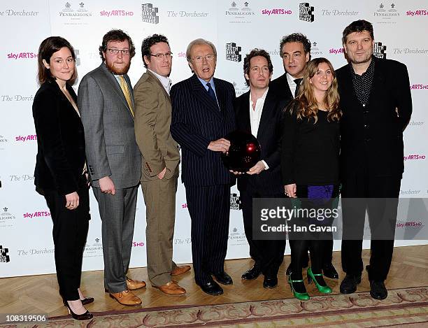 Journalist Sir David Frost poses with the cast and crew of "Rev" in the press room at the South Bank Sky Arts Awards at The Dorchester on January 25,...
