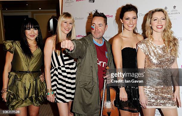 Musician Nigel Kennedy poses with Gay Yee Westerhoff, Tania Davis, Elspeth Hanson and Eos Chater of Bond during the South Bank Sky Arts Awards at The...