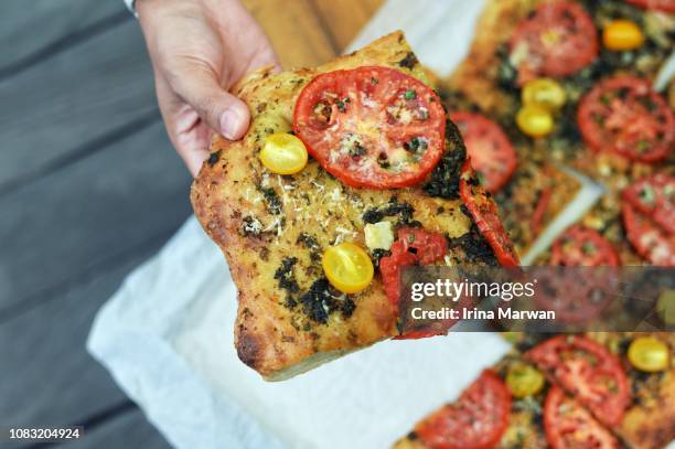 flatbread pizza with pesto sauce - eating pesto stock pictures, royalty-free photos & images