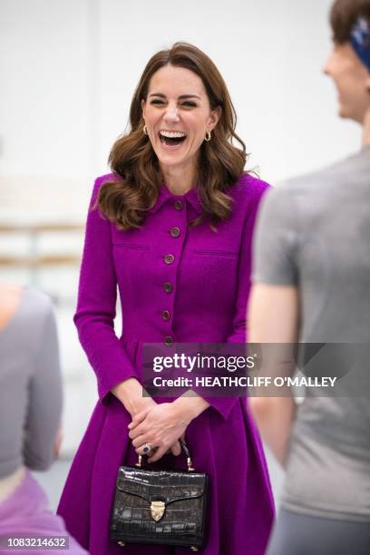 Britain's Catherine, Duchess of Cambridge, watches Royal Ballet Principal Dancers Lauren Cuthbertson and Vadim Muntagirov during a visit to the Royal...