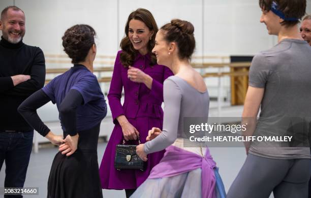 Britain's Catherine, Duchess of Cambridge, talks with Royal Ballet Principal Dancers Laura Morera, Lauren Cuthbertson and Vadim Muntagiro during a...