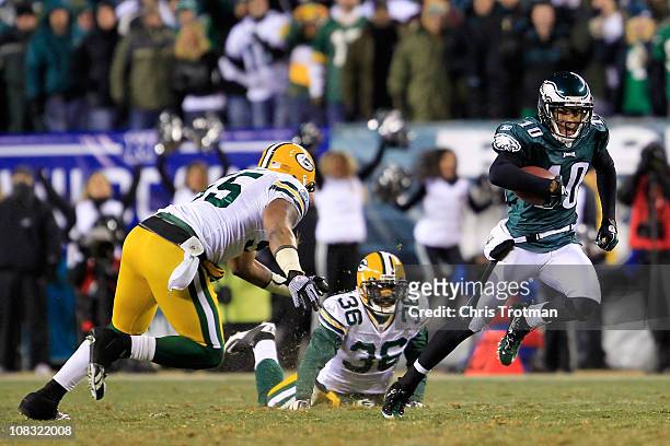 DeSean Jackson of the Philadelphia Eagles runs down field against Desmond Bishop and Nick Collins of the Green Bay Packers during the 2011 NFC wild...