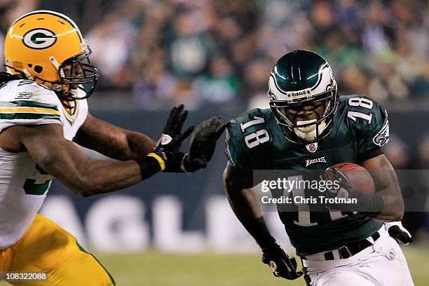 Marlin Jackson of the Philadelphia Eagles runs down field against Erik Walden of the Green Bay Packers during the 2011 NFC wild card playoff game at...