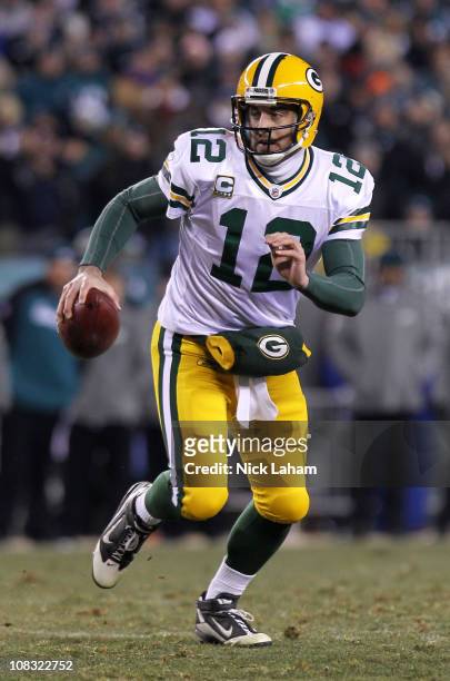 Aaron Rodgers of the Green Bay Packers scrambles against the Philadelphia Eagles during the 2011 NFC wild card playoff game at Lincoln Financial...