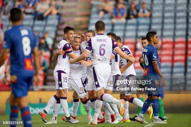 Neil Kilkenny of Perth Glory celebrates his goal with team mates during the round eight A-League match between the Newcastle Jets and the Perth Glory...