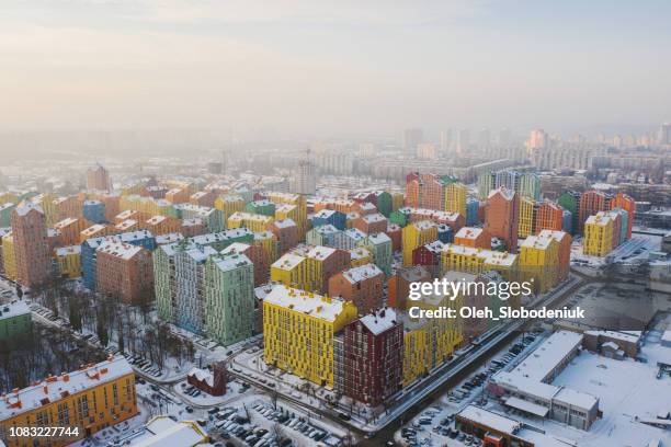 aerial view of colorful buildings in winter - kyiv skyline stock pictures, royalty-free photos & images