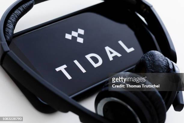 In this photo illustration the logo of the music streaming service Tidal is displayed on a smartphone on January 16, 2019 in Berlin, Germany.