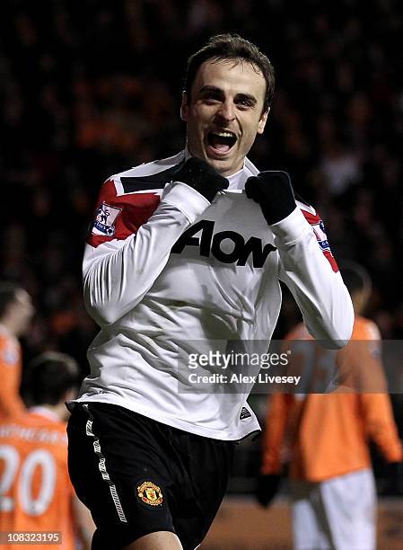 Dimitar Berbatov of Manchester United celebrates scoring his team's third goal during the Barclays Premier League match between Blackpool and...