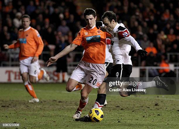 Dimitar Berbatov of Manchester United scores his team's third goal during the Barclays Premier League match between Blackpool and Manchester United...