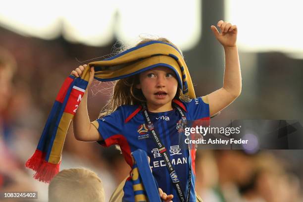 Young Jets fan shows their support during the round eight A-League match between the Newcastle Jets and the Perth Glory at McDonald Jones Stadium on...