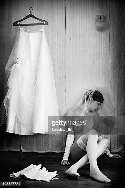 young girl - bride sits on the floor. frustration, unhappiness - crying bride stock pictures, royalty-free photos & images