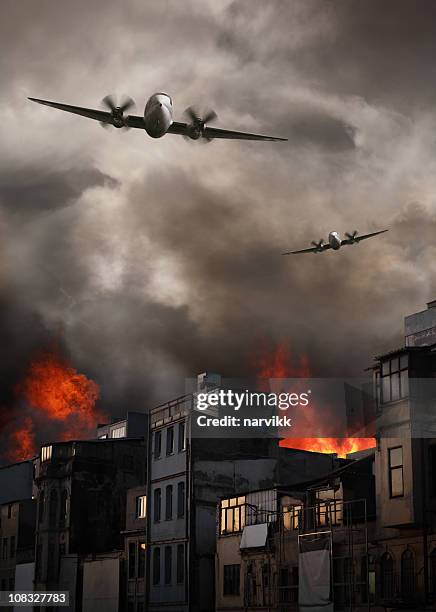 apocalyptic air raid on burning town - luchtaanval stockfoto's en -beelden