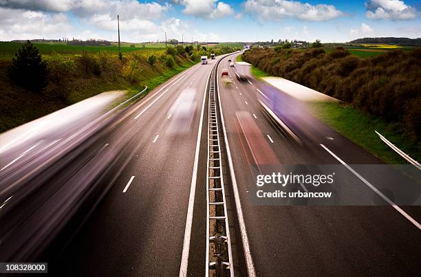 motorway traffic - highways stock pictures, royalty-free photos & images
